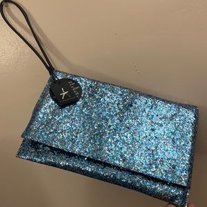 Atmosphere glitter wristlet